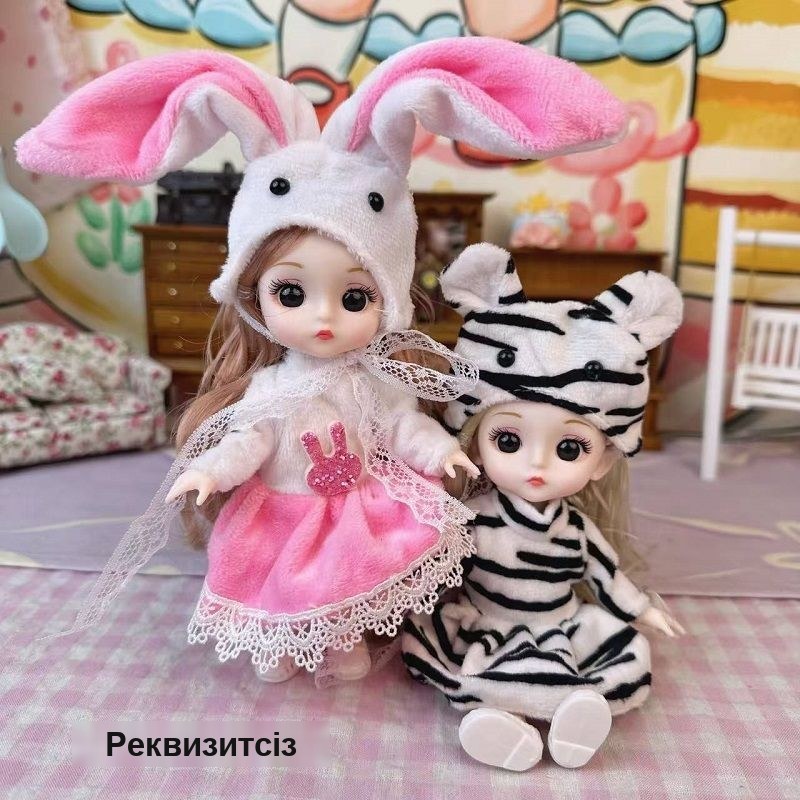 Көзілдірікті кішкентай қуыршақ
